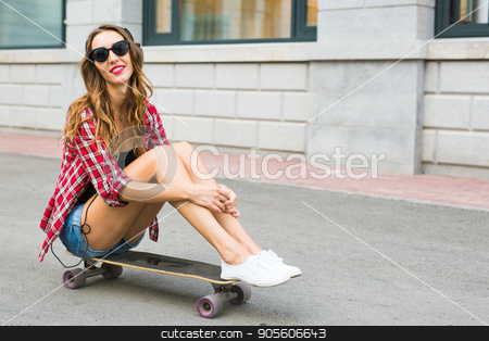 To use this stock image in your creative project, please select the size you need over to the right and click the "Add to Cart" button.
Your downloaded image will come with the Cutcaster watermark removed so don’t worry about the watermark you see on this page. Beautiful young woman in sunglasses seat on skate, street fashion lifestyle stock photo, Beautiful young woman in sunglasses seat on skate, street fashion lifestyle by Satura86