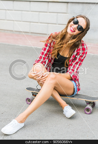 To use this stock image in your creative project, please select the size you need over to the right and click the "Add to Cart" button.
Your downloaded image will come with the Cutcaster watermark removed so don’t worry about the watermark you see on this page. Beautiful young woman in sunglasses seat on skate, street fashion lifestyle stock photo, Beautiful young woman in sunglasses seat on skate, street fashion lifestyle by Satura86