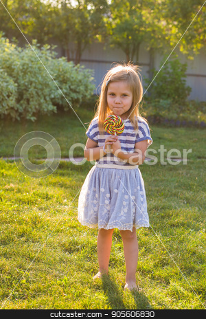 To use this stock image in your creative project, please select the size you need over to the right and click the "Add to Cart" button.
Your downloaded image will come with the Cutcaster watermark removed so don’t worry about the watermark you see on this page. cute cauasian baby girl and big lollipop stock photo, cute cauasian baby girl and big lollipop by Satura86