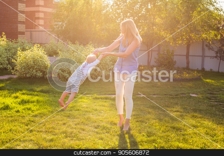 To use this stock image in your creative project, please select the size you need over to the right and click the "Add to Cart" button.
Your downloaded image will come with the Cutcaster watermark removed so don’t worry about the watermark you see on this page. happy harmonious family outdoors. mother laughing and playing with baby in the summer on the nature stock photo, happy harmonious family outdoors. mother laughing and playing with baby in the summer on the nature by Satura86