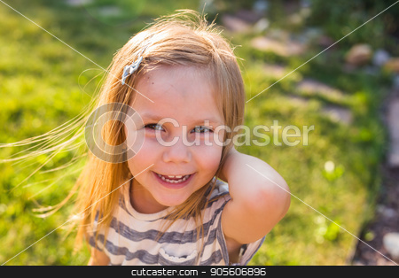 To use this stock image in your creative project, please select the size you need over to the right and click the "Add to Cart" button.
Your downloaded image will come with the Cutcaster watermark removed so don’t worry about the watermark you see on this page. Portrait of happy child girl playing in summer in nature stock photo, happy child girl playing on meadow in summer in nature by Satura86