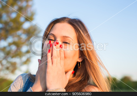 To use this stock image in your creative project, please select the size you need over to the right and click the "Add to Cart" button.
Your downloaded image will come with the Cutcaster watermark removed so don’t worry about the watermark you see on this page. Surprised young woman covering her mouth with hands outdoors stock photo, Surprised young woman covering her mouth with hands outdoors by Satura86