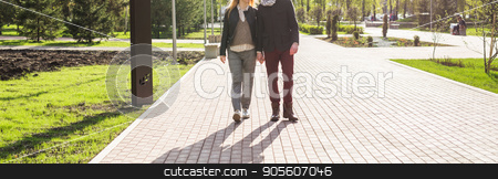 To use this stock image in your creative project, please select the size you need over to the right and click the "Add to Cart" button.
Your downloaded image will come with the Cutcaster watermark removed so don’t worry about the watermark you see on this page. Stylish couple in love holding hands on the street, woman is pregnant stock photo, Stylish couple in love holding hands on the street, woman is pregnant by Satura86