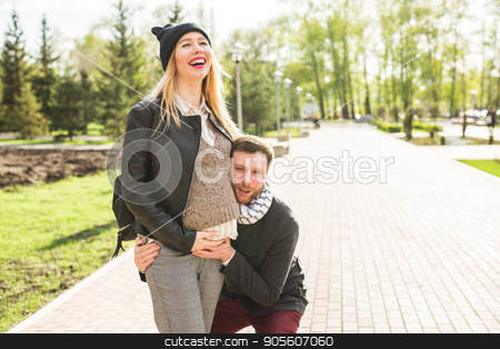 To use this stock image in your creative project, please select the size you need over to the right and click the "Add to Cart" button.
Your downloaded image will come with the Cutcaster watermark removed so don’t worry about the watermark you see on this page. Stylish pregnancy concept - portrait of couple of hipsters husband and wife in trendy clothes walking in the city park stock photo, Stylish pregnancy concept - portrait of couple of hipsters husband and wife in trendy clothes walking in the city park by Satura86