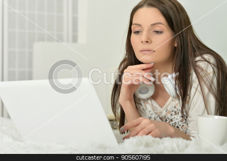 To use this stock image in your creative project, please select the size you need over to the right and click the "Add to Cart" button.
Your downloaded image will come with the Cutcaster watermark removed so don’t worry about the watermark you see on this page. young woman with headphones and laptop stock photo, Beautiful young woman with headphones and modern laptop by Ruslan Huzau