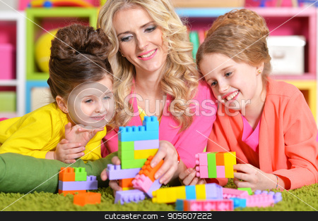 To use this stock image in your creative project, please select the size you need over to the right and click the "Add to Cart" button.
Your downloaded image will come with the Cutcaster watermark removed so don’t worry about the watermark you see on this page. young woman playing with daughters stock photo, Beautiful young woman playing with her daughters by Ruslan Huzau