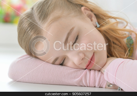 To use this stock image in your creative project, please select the size you need over to the right and click the "Add to Cart" button.
Your downloaded image will come with the Cutcaster watermark removed so don’t worry about the watermark you see on this page. Cute little girl sleeping stock photo, Cute little girl sleeping on folded arms by Ruslan Huzau