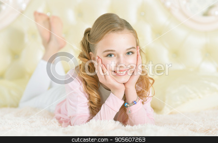 To use this stock image in your creative project, please select the size you need over to the right and click the "Add to Cart" button.
Your downloaded image will come with the Cutcaster watermark removed so don’t worry about the watermark you see on this page. Girl lying on soft plaid stock photo, Cute little girl lying on soft plaid by Ruslan Huzau