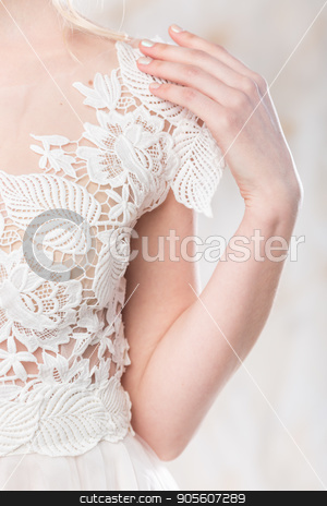 To use this stock image in your creative project, please select the size you need over to the right and click the "Add to Cart" button.
Your downloaded image will come with the Cutcaster watermark removed so don’t worry about the watermark you see on this page. fashionable gown, beautiful wedding model, bride style and concept - closeup on white graceful wedding dress of pretty young woman posing in studio, subtle embroidery and the lightness of the fabric stock photo, fashionable gown, beautiful wedding model, bride style and concept - closeup on white graceful wedding dress of pretty young woman posing in studio, subtle embroidery and the lightness of the fabric. by Dmitry