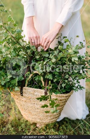 To use this stock image in your creative project, please select the size you need over to the right and click the "Add to Cart" button.
Your downloaded image will come with the Cutcaster watermark removed so don’t worry about the watermark you see on this page. nature, ecology, environment, beauty, holidays, countrylife, lifestyle concept - woman in white feast dress holding straw handbag with fresh green oak branches stock photo, nature, ecology, environment, beauty, holidays, countrylife, lifestyle concept - woman in white feast dress holding straw handbag with fresh green oak branches by Dmitry