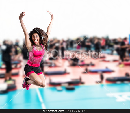 To use this stock image in your creative project, please select the size you need over to the right and click the "Add to Cart" button.
Your downloaded image will come with the Cutcaster watermark removed so don’t worry about the watermark you see on this page. Fitness teacher jumps at the gym stock photo, Happy fitness teacher jumps at the gym by Federico Caputo