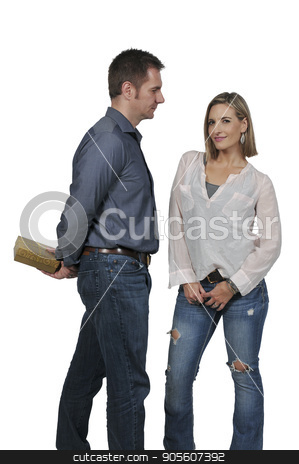 To use this stock image in your creative project, please select the size you need over to the right and click the "Add to Cart" button.
Your downloaded image will come with the Cutcaster watermark removed so don’t worry about the watermark you see on this page. Man giving a gift to a woman stock photo, Husband or boyfriend giving a present or gift to his wife or girlfriend by Robert Byron