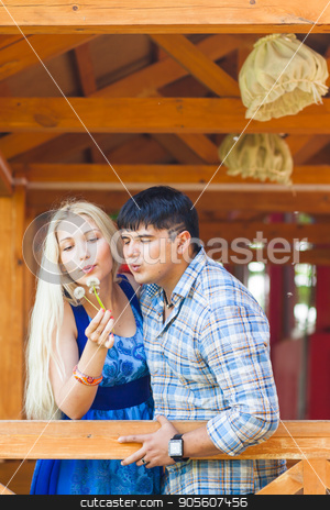 To use this stock image in your creative project, please select the size you need over to the right and click the "Add to Cart" button.
Your downloaded image will come with the Cutcaster watermark removed so don’t worry about the watermark you see on this page. Couple in love blowing dandelion on a summer day stock photo, Couple in love blowing dandelion on a summer day by Satura86