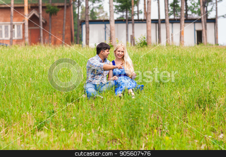 To use this stock image in your creative project, please select the size you need over to the right and click the "Add to Cart" button.
Your downloaded image will come with the Cutcaster watermark removed so don’t worry about the watermark you see on this page. young couple sitting on grass and relaxing stock photo, young couple sitting on grass and relaxing by Satura86