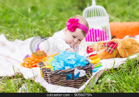To use this stock image in your creative project, please select the size you need over to the right and click the "Add to Cart" button.
Your downloaded image will come with the Cutcaster watermark removed so don’t worry about the watermark you see on this page. Adorable baby girl smile picnic playful weekend nature stock photo, baby smile picnic playful weekend nature with family by Satura86