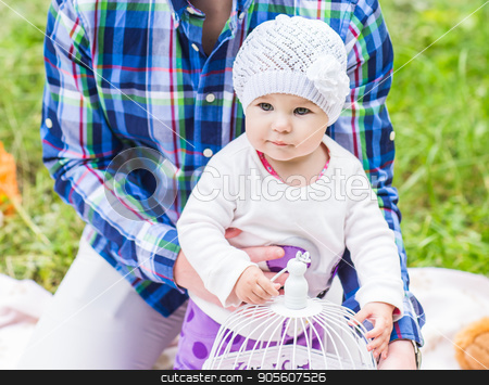 To use this stock image in your creative project, please select the size you need over to the right and click the "Add to Cart" button.
Your downloaded image will come with the Cutcaster watermark removed so don’t worry about the watermark you see on this page. Happy father play with adorable little baby daughter in nature stock photo, Portrait of happy father and his adorable little daughter by Satura86