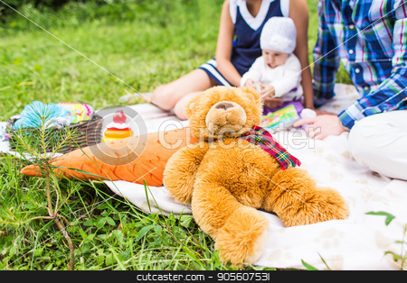 To use this stock image in your creative project, please select the size you need over to the right and click the "Add to Cart" button.
Your downloaded image will come with the Cutcaster watermark removed so don’t worry about the watermark you see on this page. baby and mother and father playing on the green grass, family picnic close-up stock photo, baby and mother and father playing on the green grass, family picnic by Satura86