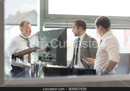 To use this stock image in your creative project, please select the size you need over to the right and click the "Add to Cart" button.
Your downloaded image will come with the Cutcaster watermark removed so don’t worry about the watermark you see on this page. Corporate businessteam working in modern office. stock photo, Corporate business people work in modern office. Project manager team solving a problem. Business crew discussing a business issue. Businessman looking at data at mobile phone monitor. by kasto