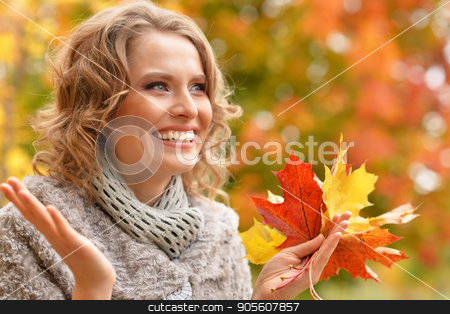 To use this stock image in your creative project, please select the size you need over to the right and click the "Add to Cart" button.
Your downloaded image will come with the Cutcaster watermark removed so don’t worry about the watermark you see on this page. Young woman resting in park stock photo, Beautiful young woman resting in autumnal park by Ruslan Huzau
