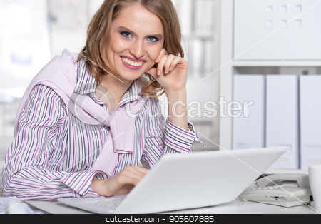 To use this stock image in your creative project, please select the size you need over to the right and click the "Add to Cart" button.
Your downloaded image will come with the Cutcaster watermark removed so don’t worry about the watermark you see on this page. Young beautiful business woman stock photo, Young beautiful business woman working in office by Ruslan Huzau