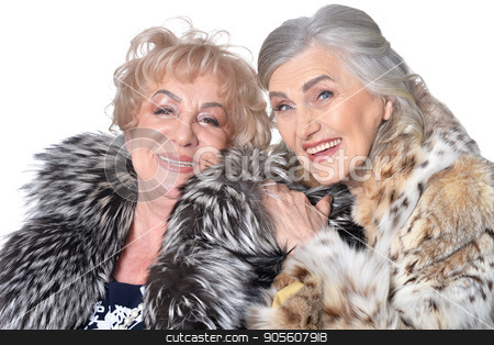 To use this stock image in your creative project, please select the size you need over to the right and click the "Add to Cart" button.
Your downloaded image will come with the Cutcaster watermark removed so don’t worry about the watermark you see on this page. Two senior women isolate on white stock photo, Senior woman hugged another while she smiling by Ruslan Huzau