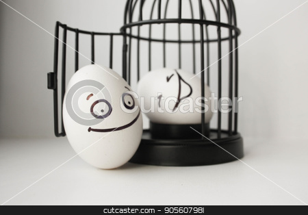 To use this stock image in your creative project, please select the size you need over to the right and click the "Add to Cart" button.
Your downloaded image will come with the Cutcaster watermark removed so don’t worry about the watermark you see on this page. Eggs with painted face. Photo for your design stock photo, Eggs with painted face. Photo for your design. two eggs. Smiling egg in a cage. by Kseniia