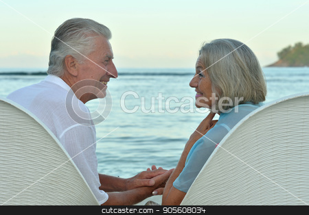 To use this stock image in your creative project, please select the size you need over to the right and click the "Add to Cart" button.
Your downloaded image will come with the Cutcaster watermark removed so don’t worry about the watermark you see on this page. Senior couple on beach stock photo, Portrait of a senior couple resting on beach by Ruslan Huzau