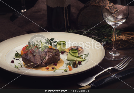 To use this stock image in your creative project, please select the size you need over to the right and click the "Add to Cart" button.
Your downloaded image will come with the Cutcaster watermark removed so don’t worry about the watermark you see on this page. Roasted beef meat stock photo, Roasted beef meat with vegetable and wine by olinchuk