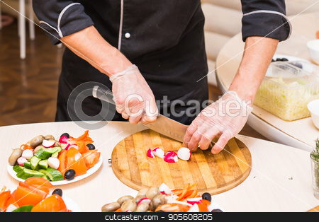 To use this stock image in your creative project, please select the size you need over to the right and click the "Add to Cart" button.
Your downloaded image will come with the Cutcaster watermark removed so don’t worry about the watermark you see on this page. Close-up of chef cooking food kitchen restaurant cutting cook hands hotel man male knife preparation fresh preparing concept stock photo, chef cooking food kitchen restaurant cutting cook hands hotel man male knife preparation fresh preparing concept by Satura86