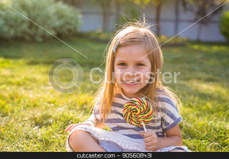 To use this stock image in your creative project, please select the size you need over to the right and click the "Add to Cart" button.
Your downloaded image will come with the Cutcaster watermark removed so don’t worry about the watermark you see on this page. Funny child with candy lollipop, happy little girl eating big sugar candy stock photo, Funny child with candy lollipop, happy little girl eating big sugar lollipop, kid eat sweets. surprised child with candy. isolated on bright background, studio. Beautiful little girl with lollipop by Satura86