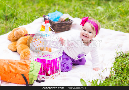 To use this stock image in your creative project, please select the size you need over to the right and click the "Add to Cart" button.
Your downloaded image will come with the Cutcaster watermark removed so don’t worry about the watermark you see on this page. Adorable baby girl smile picnic playful weekend nature stock photo, baby smile picnic playful weekend nature with family by Satura86