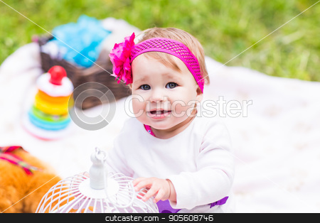 To use this stock image in your creative project, please select the size you need over to the right and click the "Add to Cart" button.
Your downloaded image will come with the Cutcaster watermark removed so don’t worry about the watermark you see on this page. Adorable baby girl smile picnic playful weekend nature stock photo, baby smile picnic playful weekend nature with family by Satura86