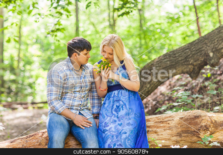 To use this stock image in your creative project, please select the size you need over to the right and click the "Add to Cart" button.
Your downloaded image will come with the Cutcaster watermark removed so don’t worry about the watermark you see on this page. Young man giving a flower dandelion to girlfriend outdoors stock photo, Young man giving a flower dandelion to girlfriend outdoors by Satura86