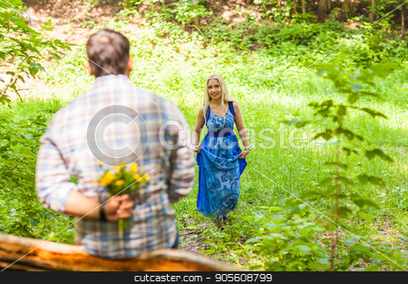 To use this stock image in your creative project, please select the size you need over to the right and click the "Add to Cart" button.
Your downloaded image will come with the Cutcaster watermark removed so don’t worry about the watermark you see on this page. Young man giving a flower dandelion to girlfriend outdoors stock photo, Young man giving a flower dandelion to girlfriend outdoors by Satura86