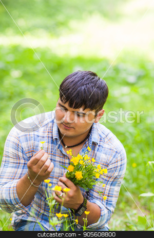 To use this stock image in your creative project, please select the size you need over to the right and click the "Add to Cart" button.
Your downloaded image will come with the Cutcaster watermark removed so don’t worry about the watermark you see on this page. Young man picking up flowers for his woman stock photo, Young man picking up flowers for his woman by Satura86