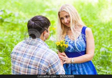 To use this stock image in your creative project, please select the size you need over to the right and click the "Add to Cart" button.
Your downloaded image will come with the Cutcaster watermark removed so don’t worry about the watermark you see on this page. Young man giving a flower dandelion to girlfriend outdoors stock photo, Young man giving a flower dandelion to girlfriend outdoors by Satura86