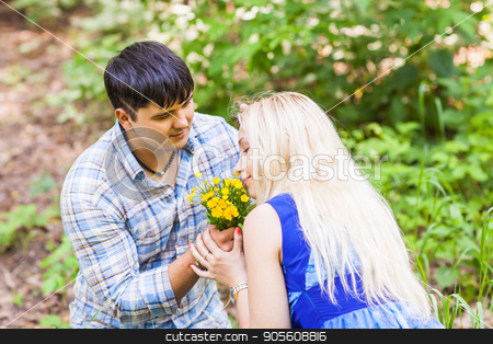 To use this stock image in your creative project, please select the size you need over to the right and click the "Add to Cart" button.
Your downloaded image will come with the Cutcaster watermark removed so don’t worry about the watermark you see on this page. Young man giving a flower dandelion to girlfriend outdoors stock photo, Young man giving a flower dandelion to girlfriend outdoors by Satura86