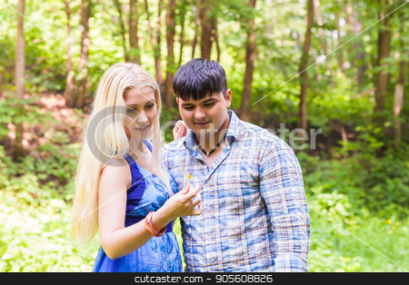 To use this stock image in your creative project, please select the size you need over to the right and click the "Add to Cart" button.
Your downloaded image will come with the Cutcaster watermark removed so don’t worry about the watermark you see on this page. butterfly on woman and man hands in nature stock photo, butterfly on woman and man hands in nature by Satura86
