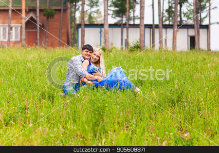 To use this stock image in your creative project, please select the size you need over to the right and click the "Add to Cart" button.
Your downloaded image will come with the Cutcaster watermark removed so don’t worry about the watermark you see on this page. young couple sitting on grass and relaxing stock photo, young couple sitting on grass and relaxing by Satura86
