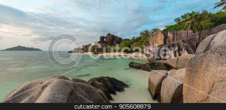 To use this stock image in your creative project, please select the size you need over to the right and click the "Add to Cart" button.
Your downloaded image will come with the Cutcaster watermark removed so don’t worry about the watermark you see on this page. Dramatic sunset at Anse Source d'Argent beach, La Digue island, Seychelles stock photo, Beautifully shaped granite boulders and a dramatic sunset at picture perfect tropical Anse Source d'Argent beach, La Digue island, Seychelles. by kasto