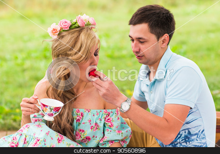 To use this stock image in your creative project, please select the size you need over to the right and click the "Add to Cart" button.
Your downloaded image will come with the Cutcaster watermark removed so don’t worry about the watermark you see on this page. Handsome man is feeding his beautiful woman with a delicious donut in picnic on nature stock photo, Handsome man is feeding his beautiful woman with a delicious donut in picnic on nature by Satura86