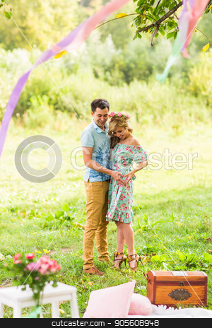 To use this stock image in your creative project, please select the size you need over to the right and click the "Add to Cart" button.
Your downloaded image will come with the Cutcaster watermark removed so don’t worry about the watermark you see on this page. Beautiful young couple is making heart of fingers and smiling in nature stock photo, Beautiful young couple is making heart of fingers and smiling in nature by Satura86