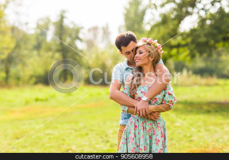 To use this stock image in your creative project, please select the size you need over to the right and click the "Add to Cart" button.
Your downloaded image will come with the Cutcaster watermark removed so don’t worry about the watermark you see on this page. happy young couple hugging on nature stock photo, happy young couple kissing and hugging on nature by Satura86