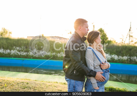 To use this stock image in your creative project, please select the size you need over to the right and click the "Add to Cart" button.
Your downloaded image will come with the Cutcaster watermark removed so don’t worry about the watermark you see on this page. Happy young pregnant couple hugging in nature stock photo, Happy and young pregnant couple hugging in nature by Satura86