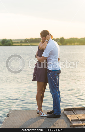 To use this stock image in your creative project, please select the size you need over to the right and click the "Add to Cart" button.
Your downloaded image will come with the Cutcaster watermark removed so don’t worry about the watermark you see on this page. Romantic Couple on the pier stock photo, Romantic Couple on the pier in nature by Satura86