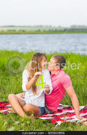 To use this stock image in your creative project, please select the size you need over to the right and click the "Add to Cart" button.
Your downloaded image will come with the Cutcaster watermark removed so don’t worry about the watermark you see on this page. Man and woman holding the number 4 in nature. Concept of numbers, measurement, amount, quantity, accounting and mathematics stock photo, Man and woman holding the number 4 in nature. Concept of numbers, measurement, amount, quantity, accounting and mathematics by Satura86