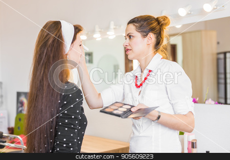 To use this stock image in your creative project, please select the size you need over to the right and click the "Add to Cart" button.
Your downloaded image will come with the Cutcaster watermark removed so don’t worry about the watermark you see on this page. beauty and makeup concept - closeup portrait of beautiful woman getting professional make-up with brush stock photo, beauty and makeup concept - closeup portrait of beautiful woman getting professional make-up with brush by Satura86