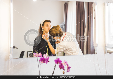 To use this stock image in your creative project, please select the size you need over to the right and click the "Add to Cart" button.
Your downloaded image will come with the Cutcaster watermark removed so don’t worry about the watermark you see on this page. make-up artist doing makeup beautiful girl in the salon, beauty concept and style stock photo, make-up artist doing make-up beautiful girl in the salon, beauty concept and style by Satura86