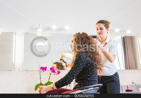 To use this stock image in your creative project, please select the size you need over to the right and click the "Add to Cart" button.
Your downloaded image will come with the Cutcaster watermark removed so don’t worry about the watermark you see on this page. Hairdresser doing haircut for women in hairdressing salon. Concept of fashion and beauty. Positive emotion stock photo, Hairdresser doing haircut for women in hairdressing salon. Concept of fashion and beauty. Positive emotion by Satura86