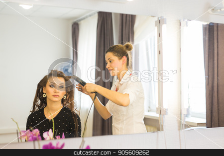 To use this stock image in your creative project, please select the size you need over to the right and click the "Add to Cart" button.
Your downloaded image will come with the Cutcaster watermark removed so don’t worry about the watermark you see on this page. Hairdresser doing haircut for women in hairdressing salon. Concept of fashion and beauty. Positive emotion stock photo, Hairdresser doing haircut for women in hairdressing salon. Concept of fashion and beauty. Positive emotion by Satura86